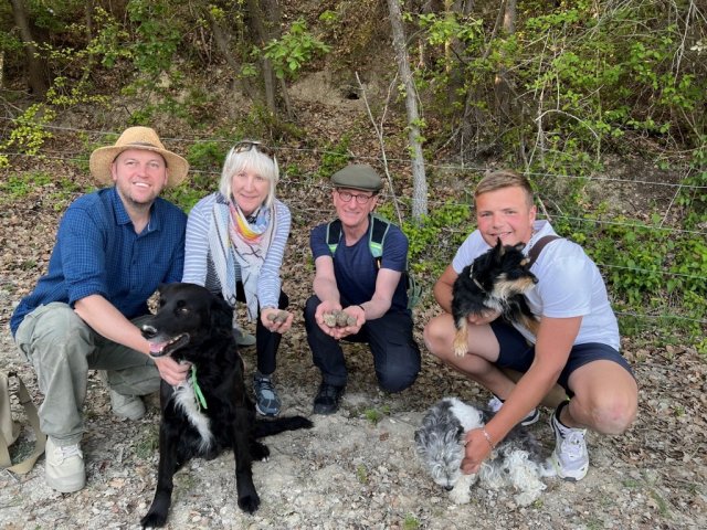 Travelers Carol and Bruce on a truffle hunt with trained dogs and their owners