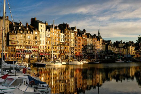 Beautiful buildings at sunset in Honfleur habor, Normandy, France