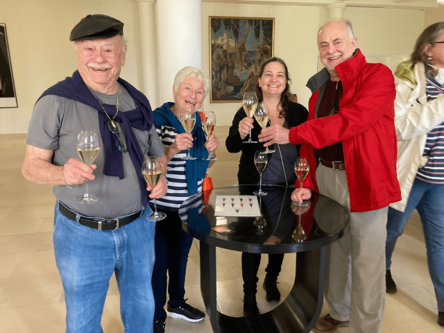 Travelers Alex and Judy enjoying a Champagne tasting at the Taittinger Champagne House in Reims Travelers Alex and Judy enjoying a Champagne tasting with friends at the Taittinger Champagne House in Reims