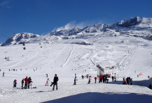 Skiing at Alpe d'Huez in the French Alps Skiing at Alpe d'Huez in the French Alps