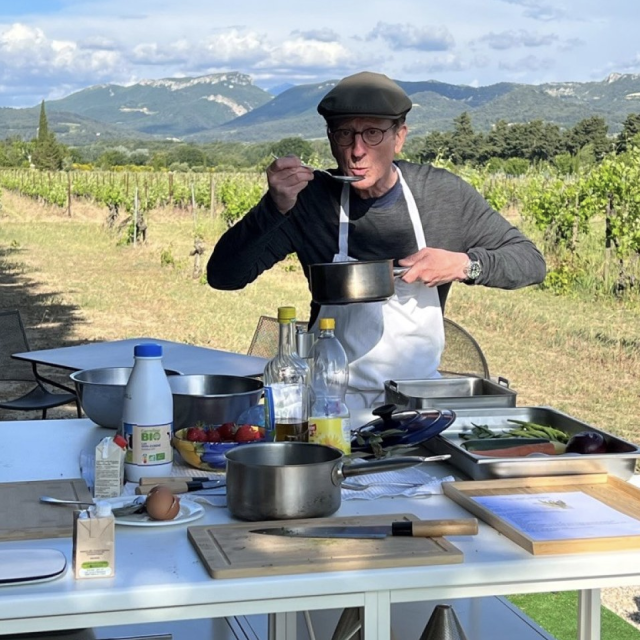 Bruce from Australia enjoying his cooking class with Chef Benoit Bruce from Australia enjoying his cooking class with Chef Benoit