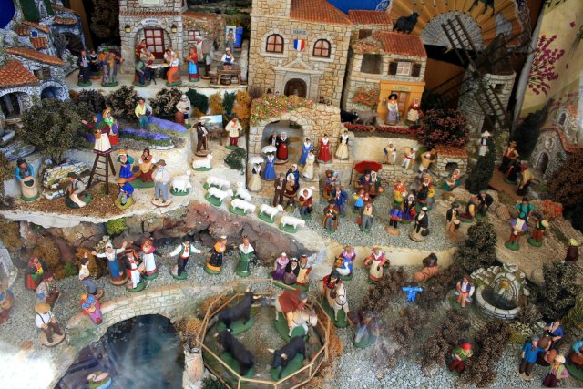 Nativity scene with many figurine villagers - a typical Provence village Christmas scene