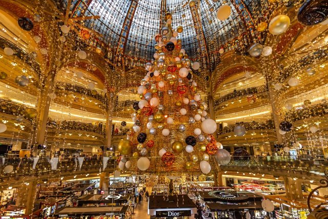 The golden Christmas tree in the atrium of Galeries Lafayette in Paris