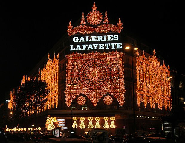 Galeries Lafayette department store in Paris covered with Christmas lights