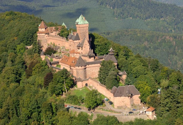 Haut-Koenigsbourg Castle Haut-Koenigsbourg Castle in Alsace viewed from above surrounded by green forest