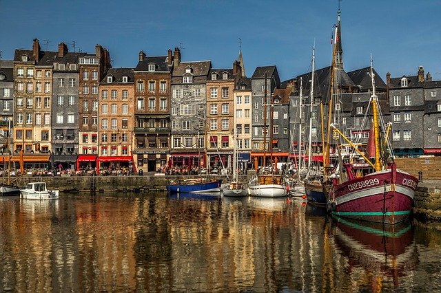 The colorful old buildings lining Honfleur harbor in Normandy