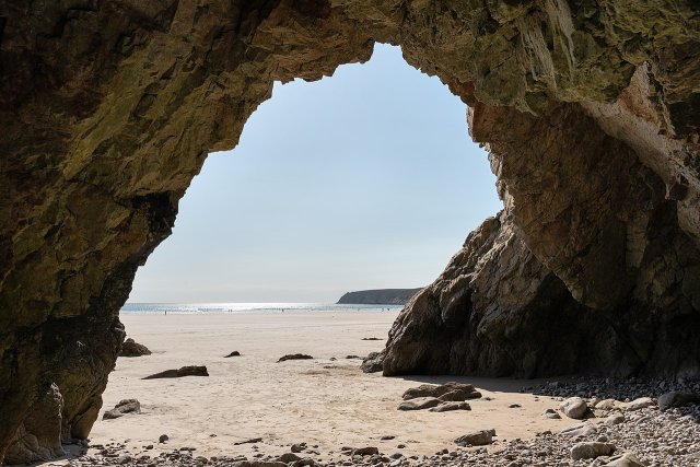 View of Kerloc'h beach in Brittany from inside a cave