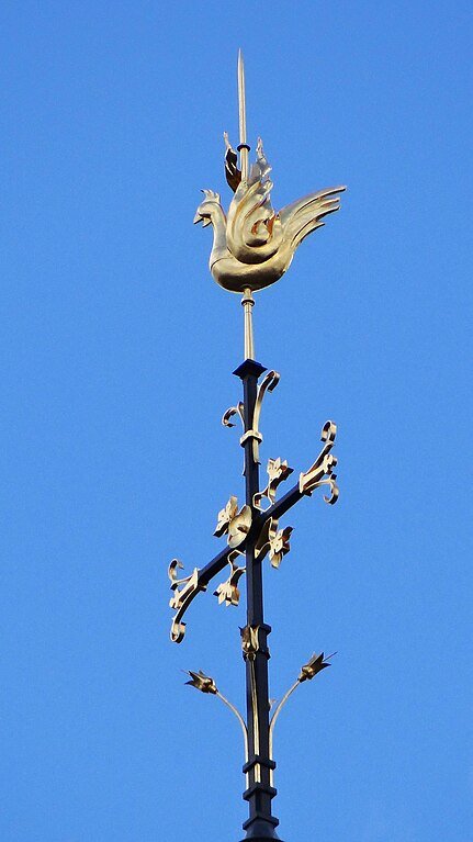 The gilded rooster at the top of the spire