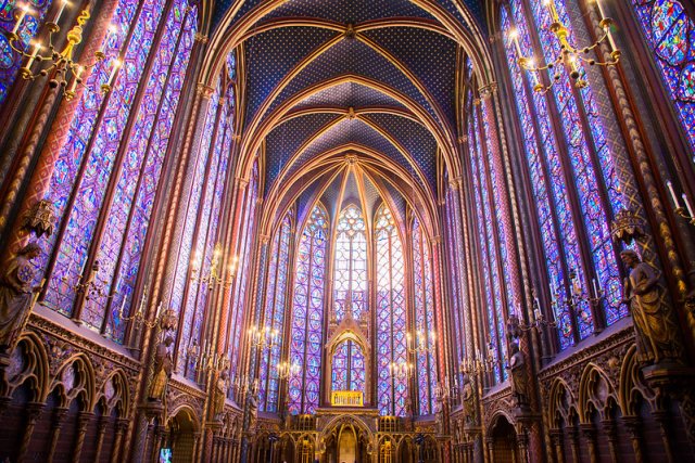 Inside Sainte Chapelle in Paris, with the 16 enormous stained glass windows