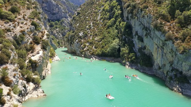 Kayaks and paddleboats on the Verdon Gorge View of kayaks and paddleboats on the turquoise waters of the Verdon Gorge