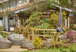 Relax in the garden by the swimming pool Relax in the garden by the swimming pool