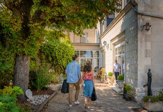 Stay in a lively town, across the street from a gorgeous castle...