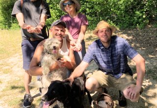 Travelers Beth & Joe from the US with the truffle hunters and their dogs Beth & Joe with the truffle hunters and their dogs with the truffles they have dug up