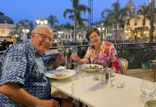 Travelers Chris & Susan at a restaurant in Monte Carlo Travelers Chris & Susan at a restaurant in Monte Carlo