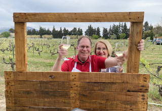 Travelers Diana and Michael enjoying a wine tasting at a Provence vineyardTravelers Diana and Michael enjoying a wine tasting at a Provence vineyard Travelers Diana and Michael enjoying a wine tasting at a Provence vineyard