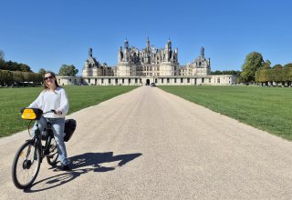 Cycling by Chambord Castle