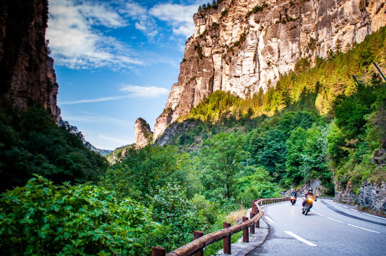 Motorcycles on the road in France, riding by the Gorges de Daluis