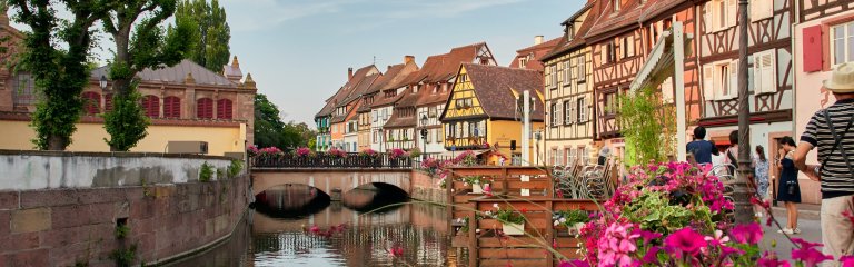 Colmar, Alsace, canal, flowers and half-timbered houses