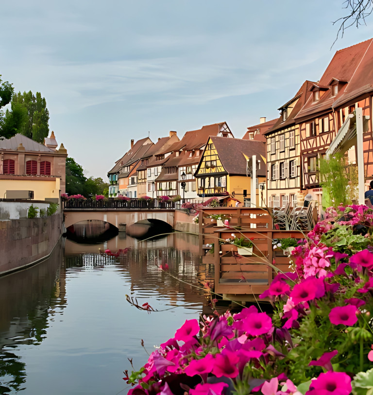 Colmar, Alsace, canal, flowers and half-timbered houses