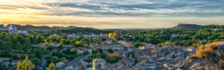 A hilltop view over a small town in Provence in September