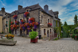 Beautiful flower displays on a house in the village of Rochefort-en-Terre in Brittany