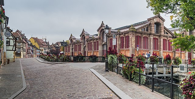 Covered market and cobbled streets of Colmar, Alsace, hidden gems in France