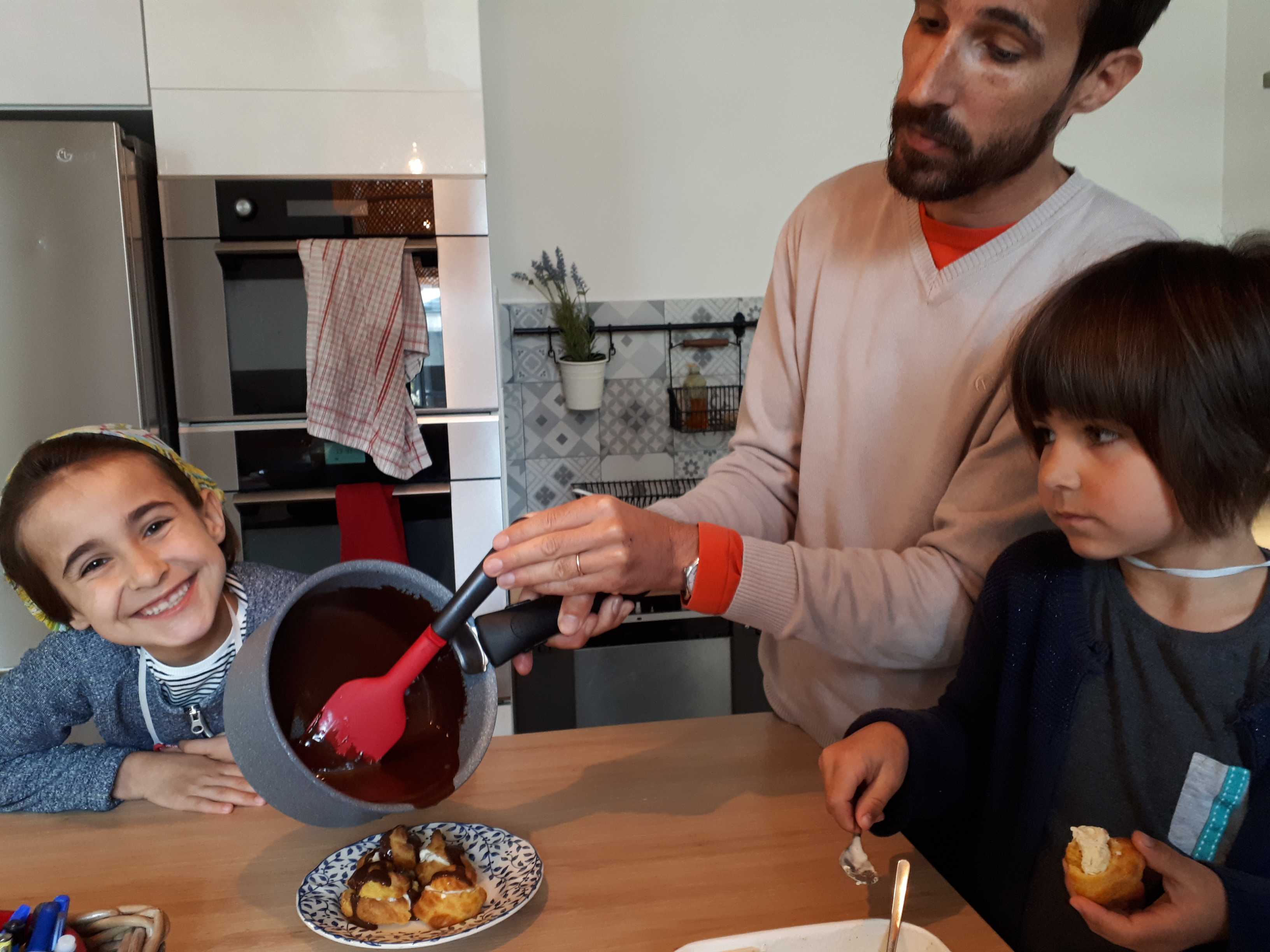 Making homemade chocolate profiteroles