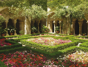 The floral garden courtyard of Saint-Paul-de-Mausole, where Vincent van Gogh spent a year in treatment
